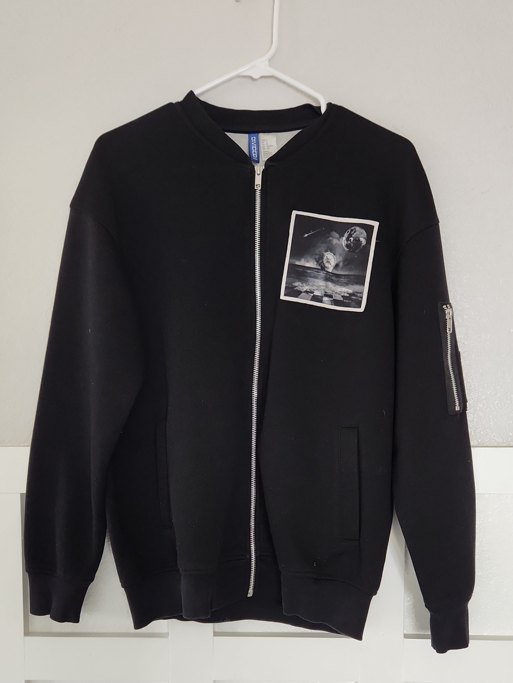 Divided Black Zip-Up Sweater with Monochrome Space Patch